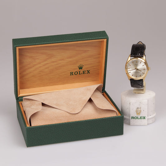 Rolex Oyster Perpetual 750er Gold am Lederband Vintage