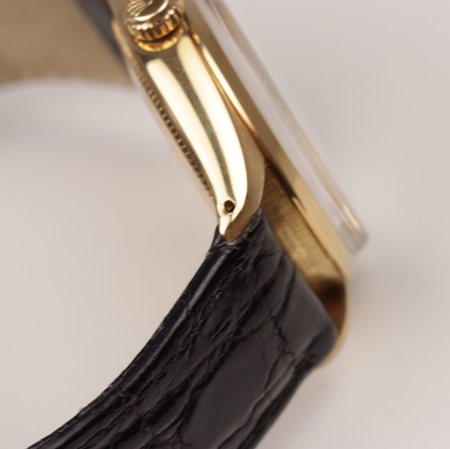 Rolex Oyster Perpetual 750er Gold am Lederband Vintage