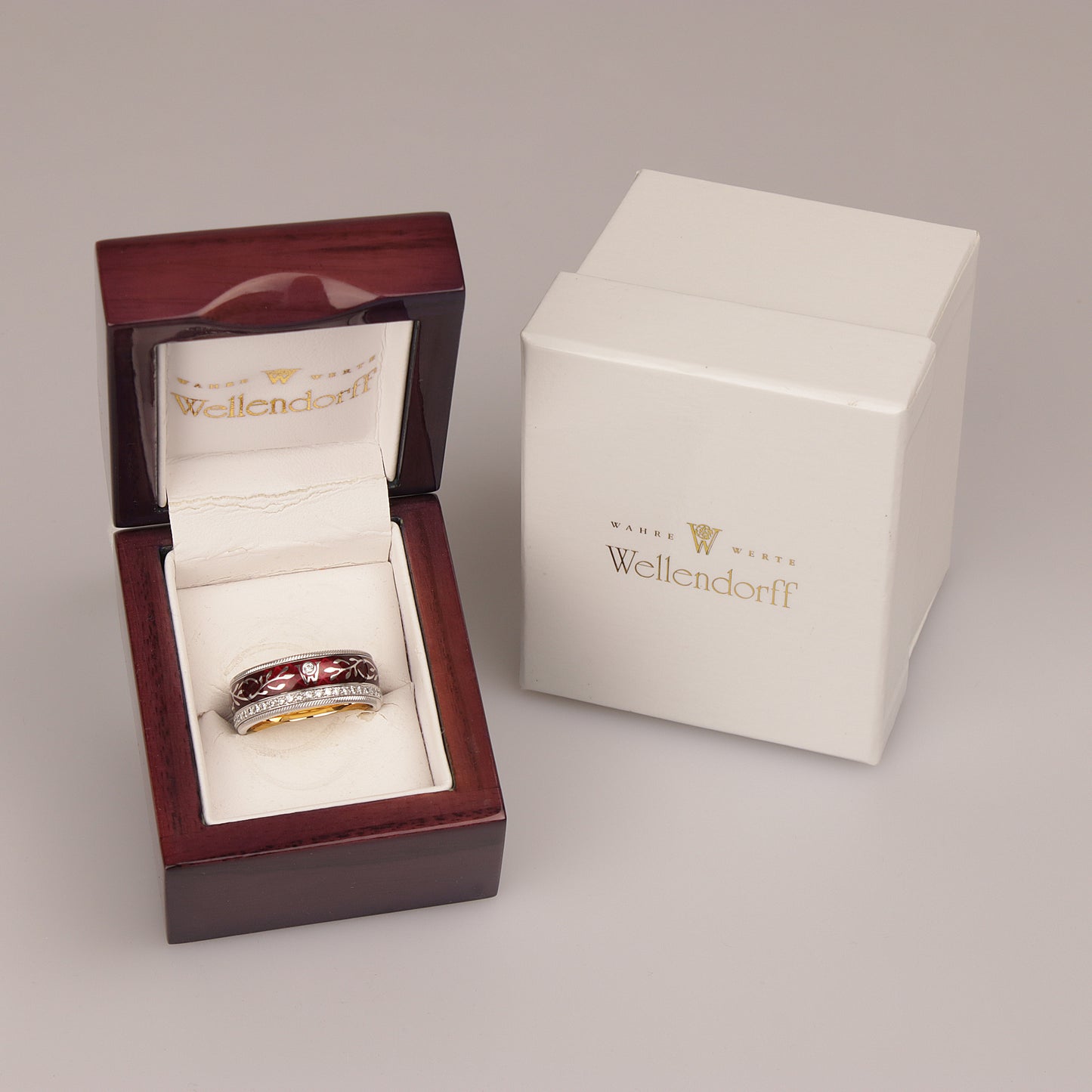 Wellendorff | roter Mohn | Drehring 750/- | instruierte-Fassung | ca. 0,55 ct Gvvs1 | Emaille